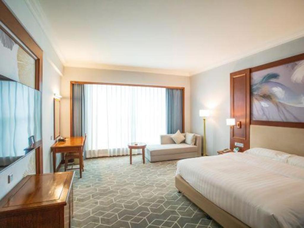 Fenggang Gladden Hotel Tiantangwei Exterior foto