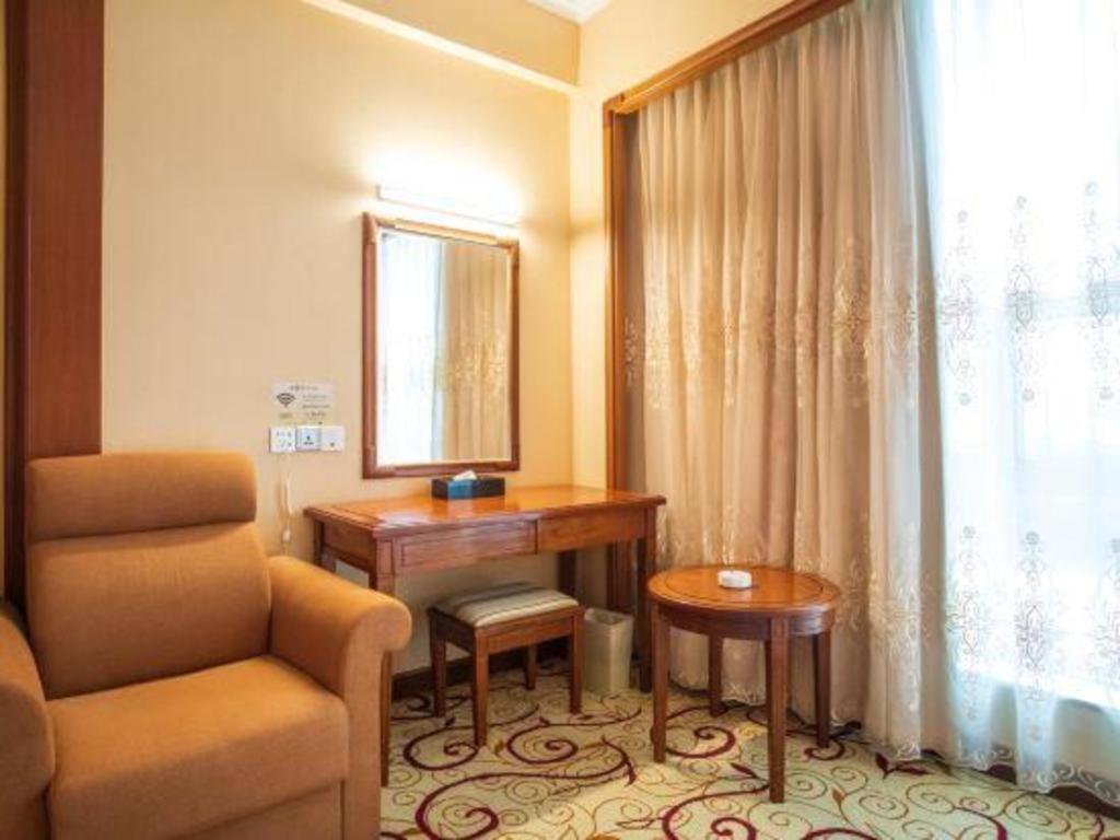 Fenggang Gladden Hotel Tiantangwei Exterior foto