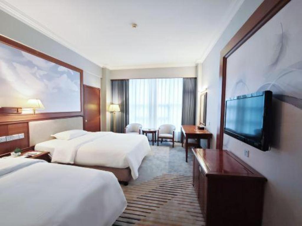 Fenggang Gladden Hotel Tiantangwei Exterior foto